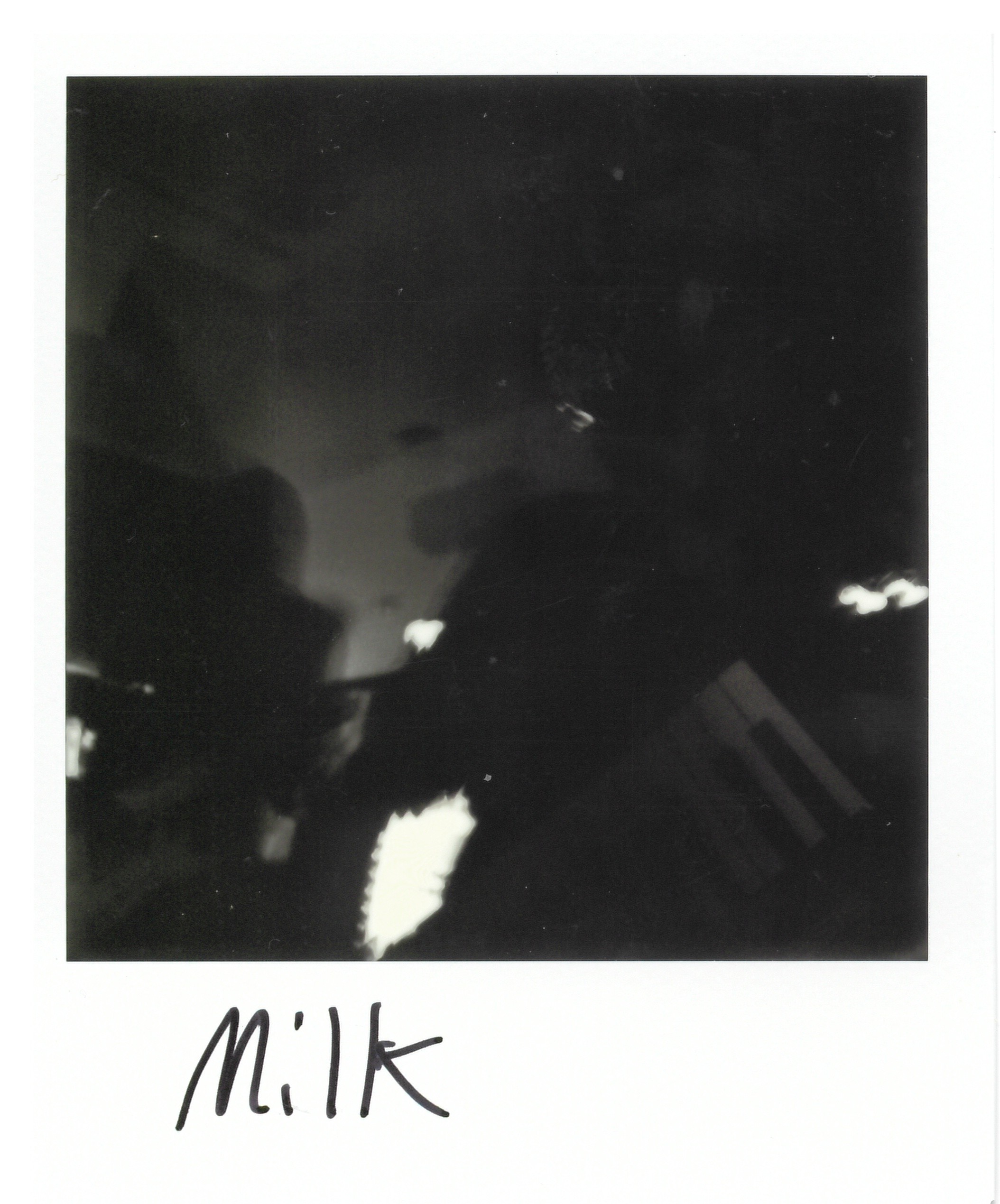 Extremely distorted photo of the Keytarist and Guitarist